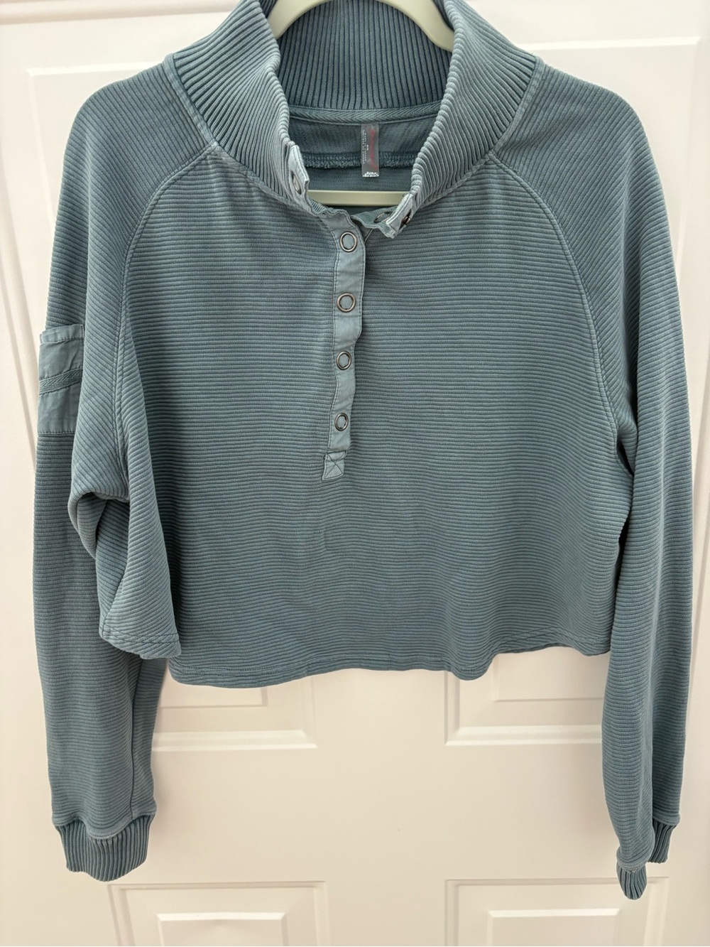 FP Movement by Free People Cropped Ribbed Henley Pullover in Dusty Blue-Green